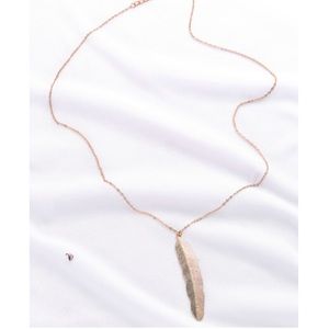 Gold feather pendant necklace!.